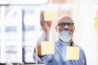 man with post it notes