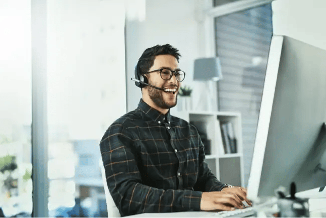 happy man on computer