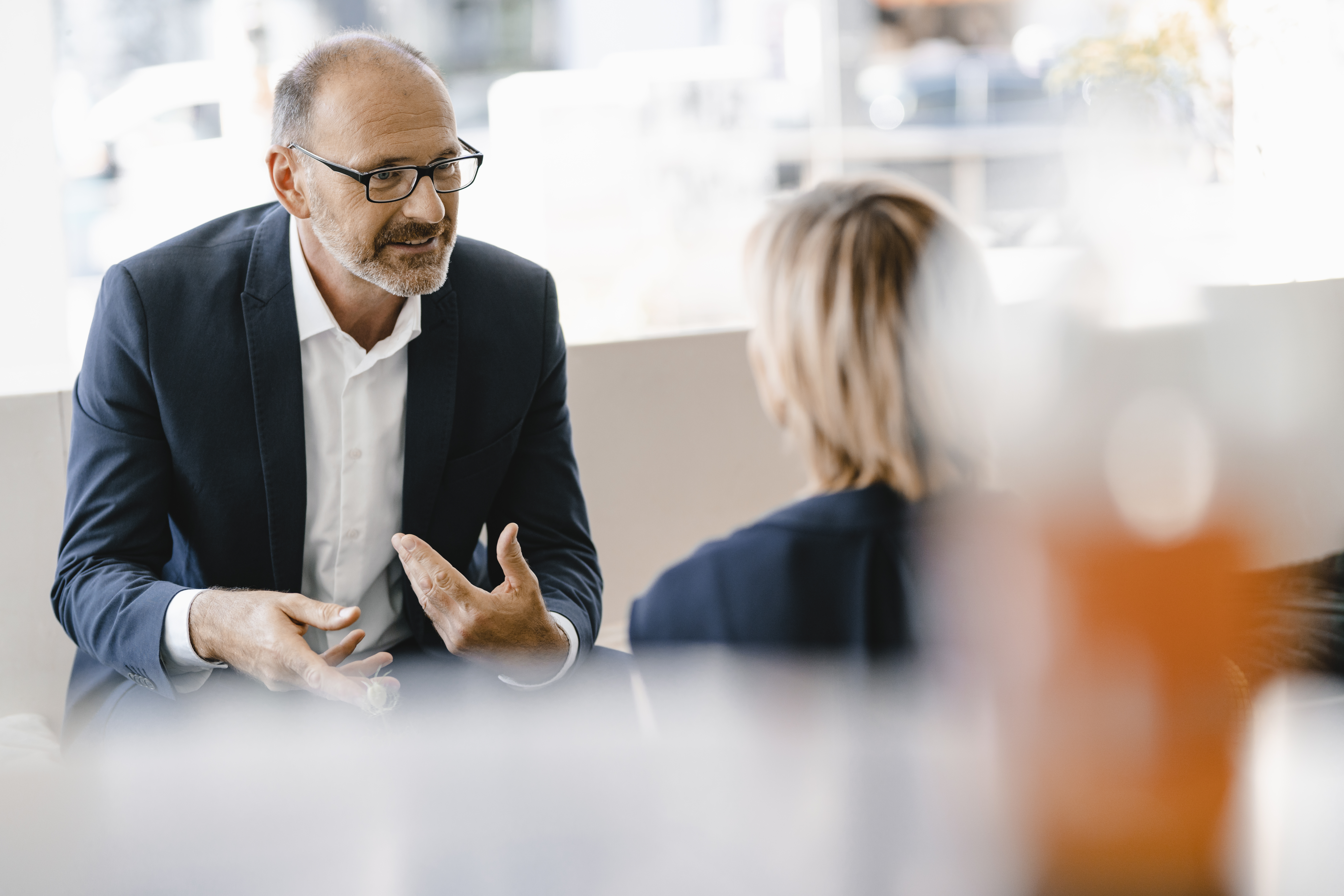 man talking to woman