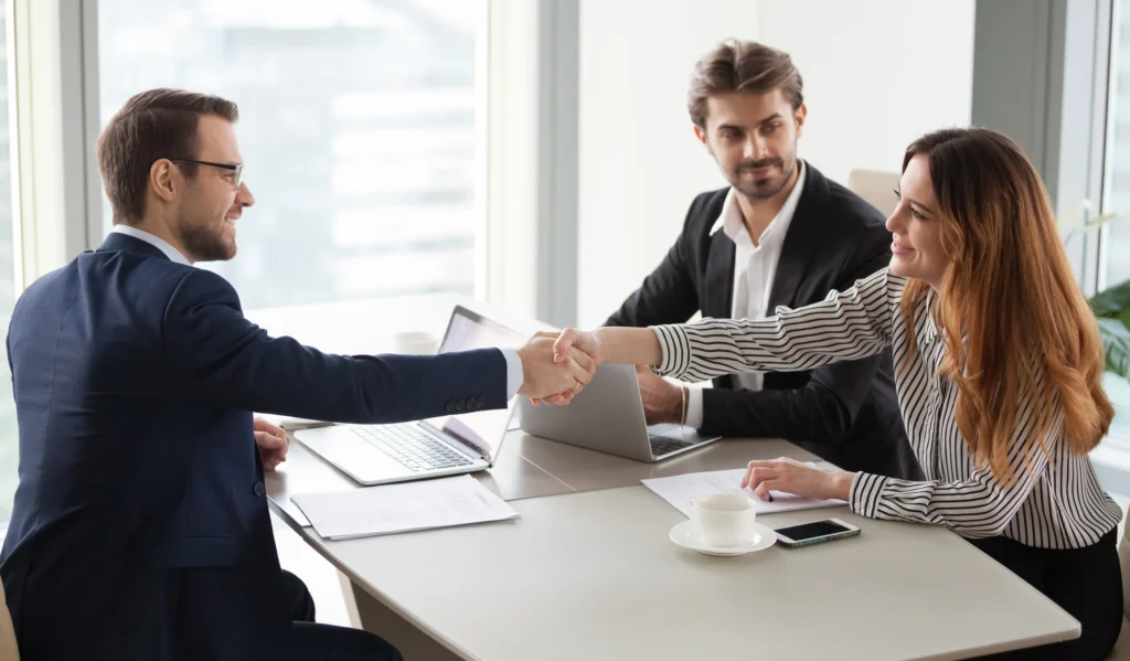 Client shaking hands with agent