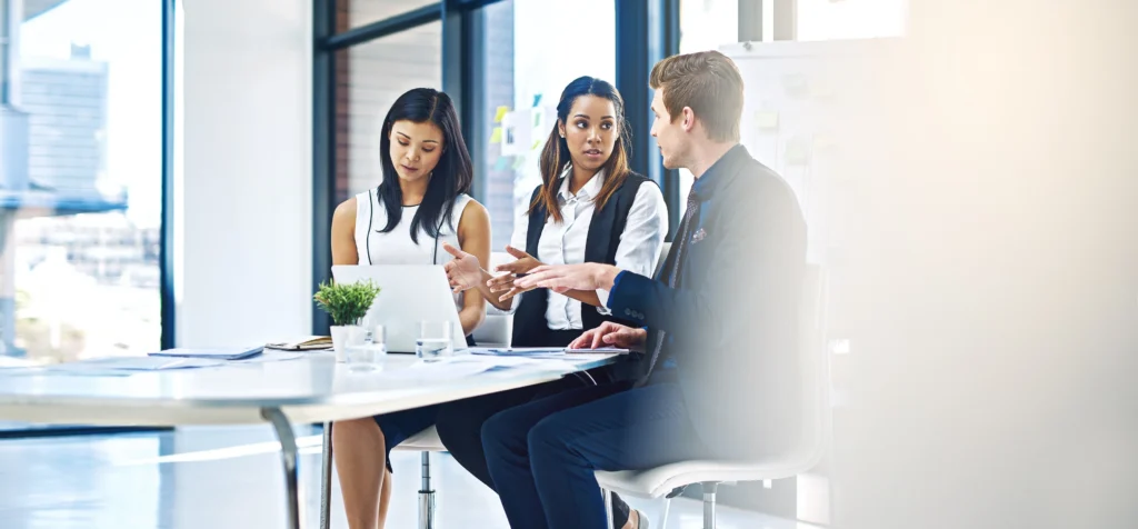 three people meeting
