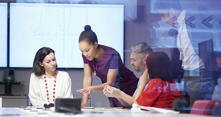 woman pointing at tablet